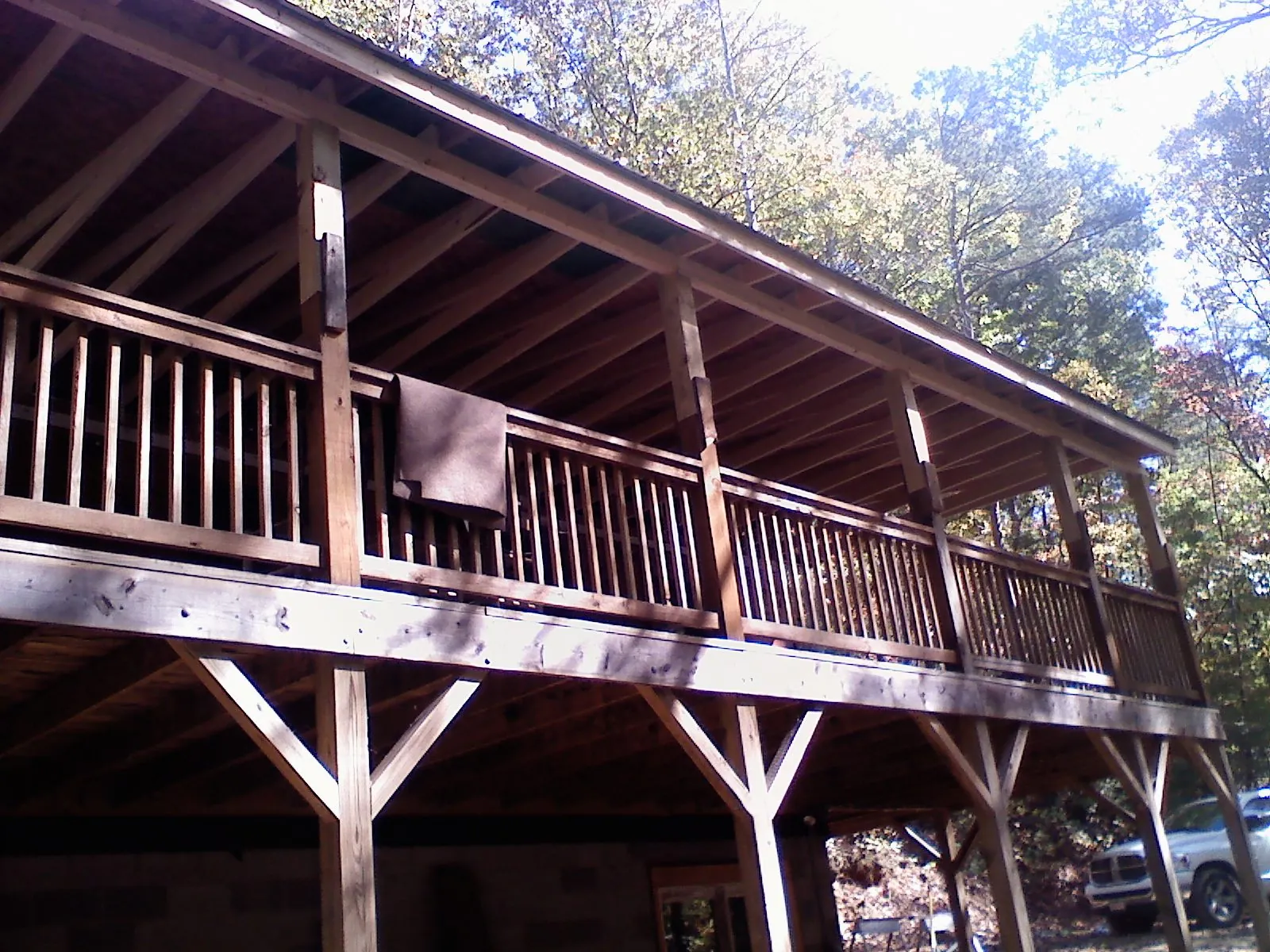 Timber framing under a new elevated porch and deck — Roof Leak Repair in Ketchum by Roofing Brothers